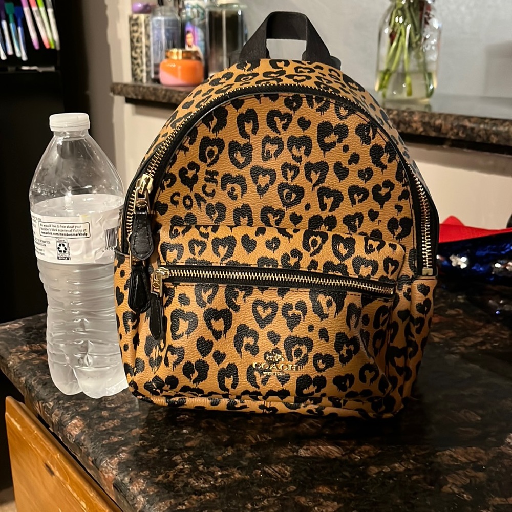 Coach cheetah print mini pack pack.